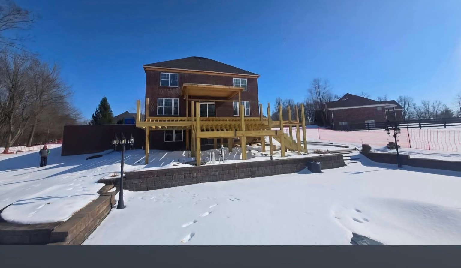 Three-level Trex deck — wide construction and framing view