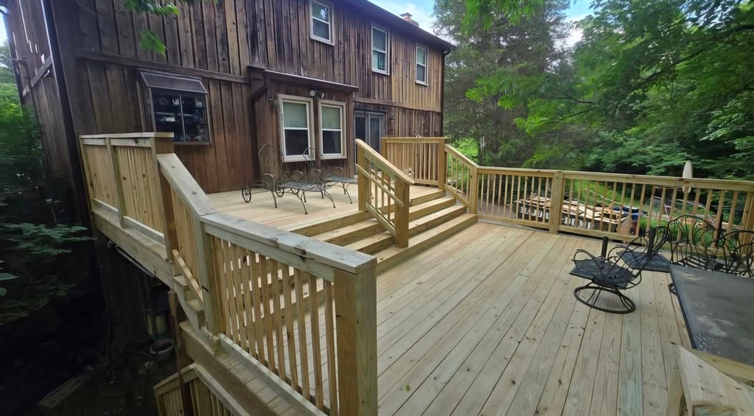 Multi-level wood deck — completed upper levels and stairs
