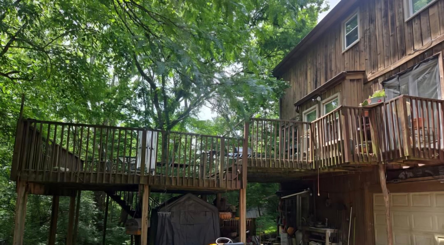Multi-level wood deck — existing condition before resurfacing